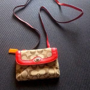 New never used small coach bag monogram